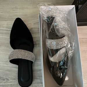 Black mules with sparkle strap. Marked as size 9 but fit more like 8.5.